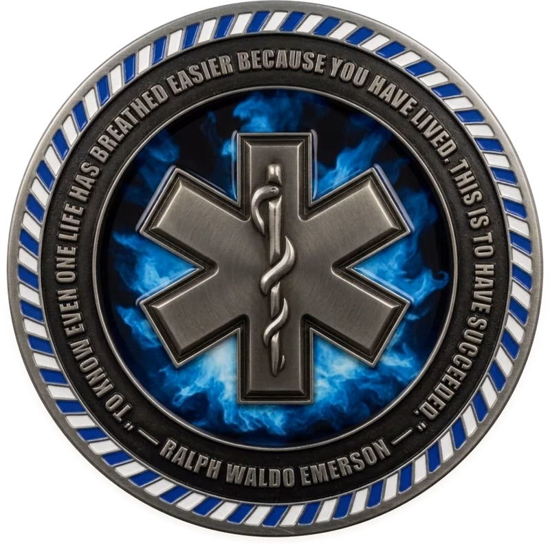 An antique silver EMS coin with a blue Star of Life on a navy EMS jacket below its reflective stripe