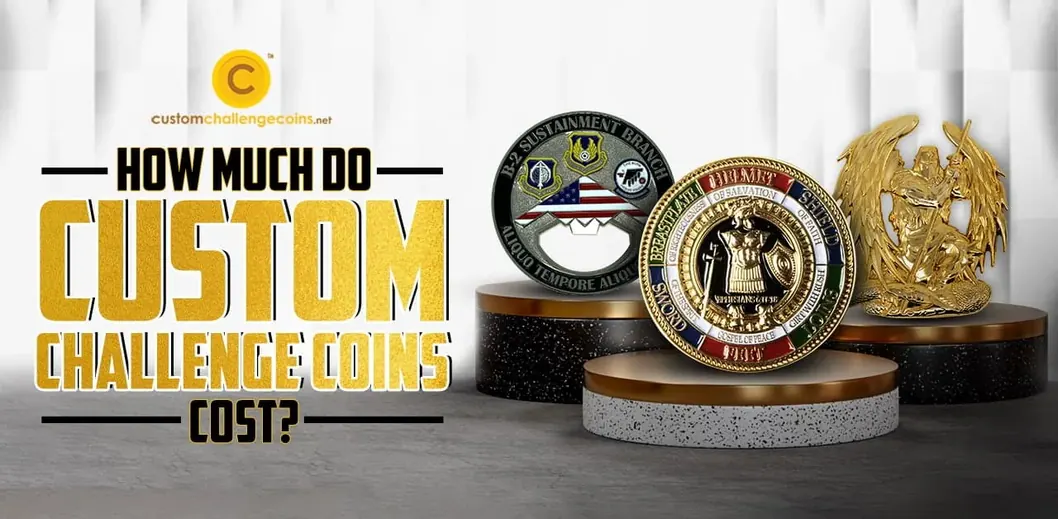 Three gold and silver challenge coins on display stands